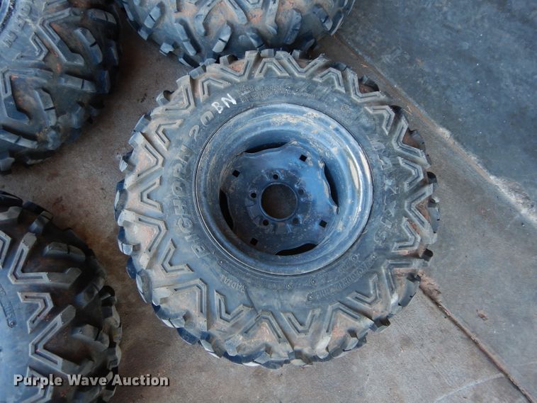 image for item GF9991 (4) 27x9.00R12 foam-filled tires and wheels