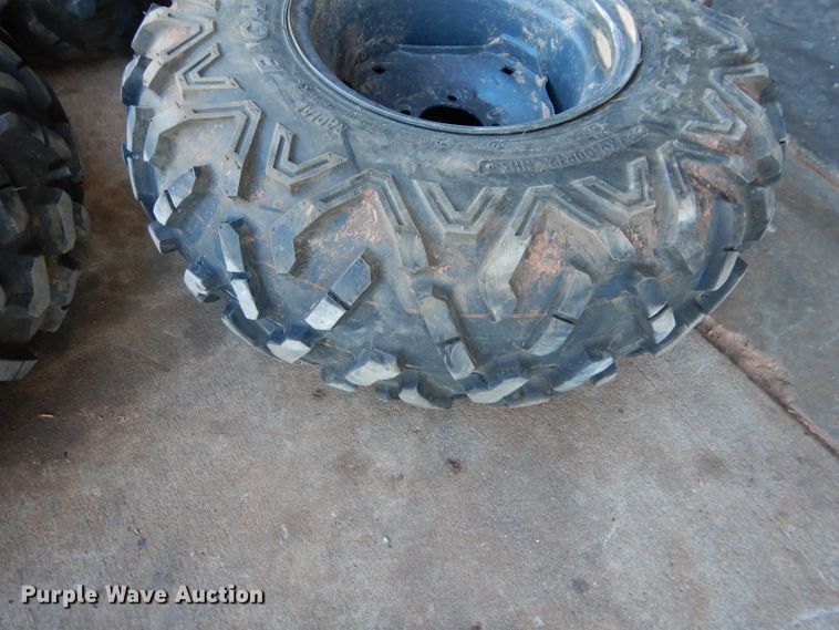 image for item GF9991 (4) 27x9.00R12 foam-filled tires and wheels