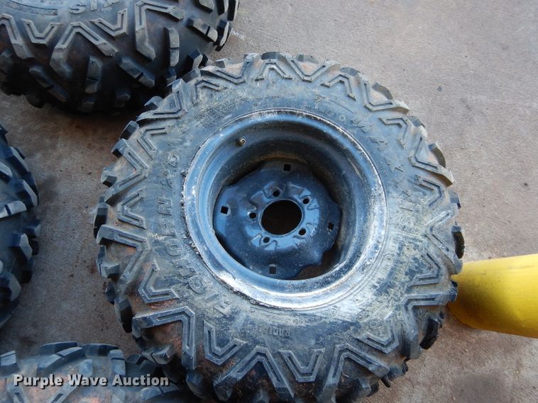 image for item GF9991 (4) 27x9.00R12 foam-filled tires and wheels