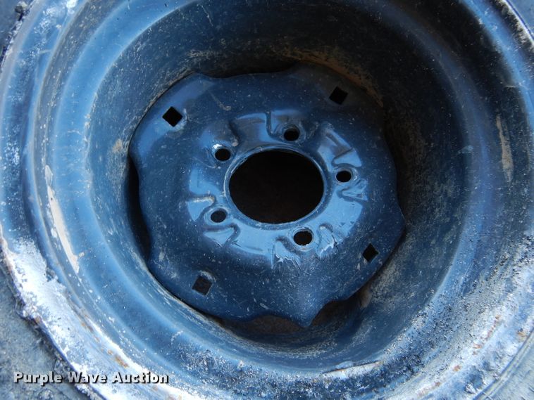 image for item GF9991 (4) 27x9.00R12 foam-filled tires and wheels