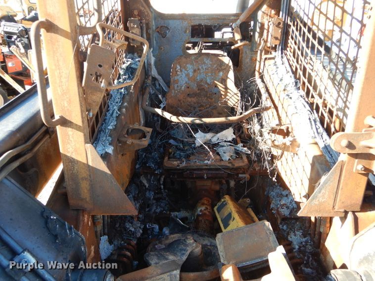 image for item DH6936 2015 John Deere 323E skid steer