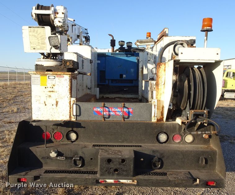 image for item GC9142 2003 Freightliner FL70 service truck with crane