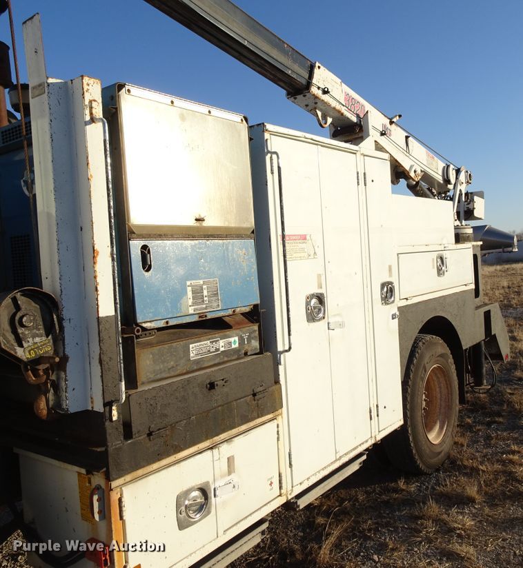 image for item GC9142 2003 Freightliner FL70 service truck with crane