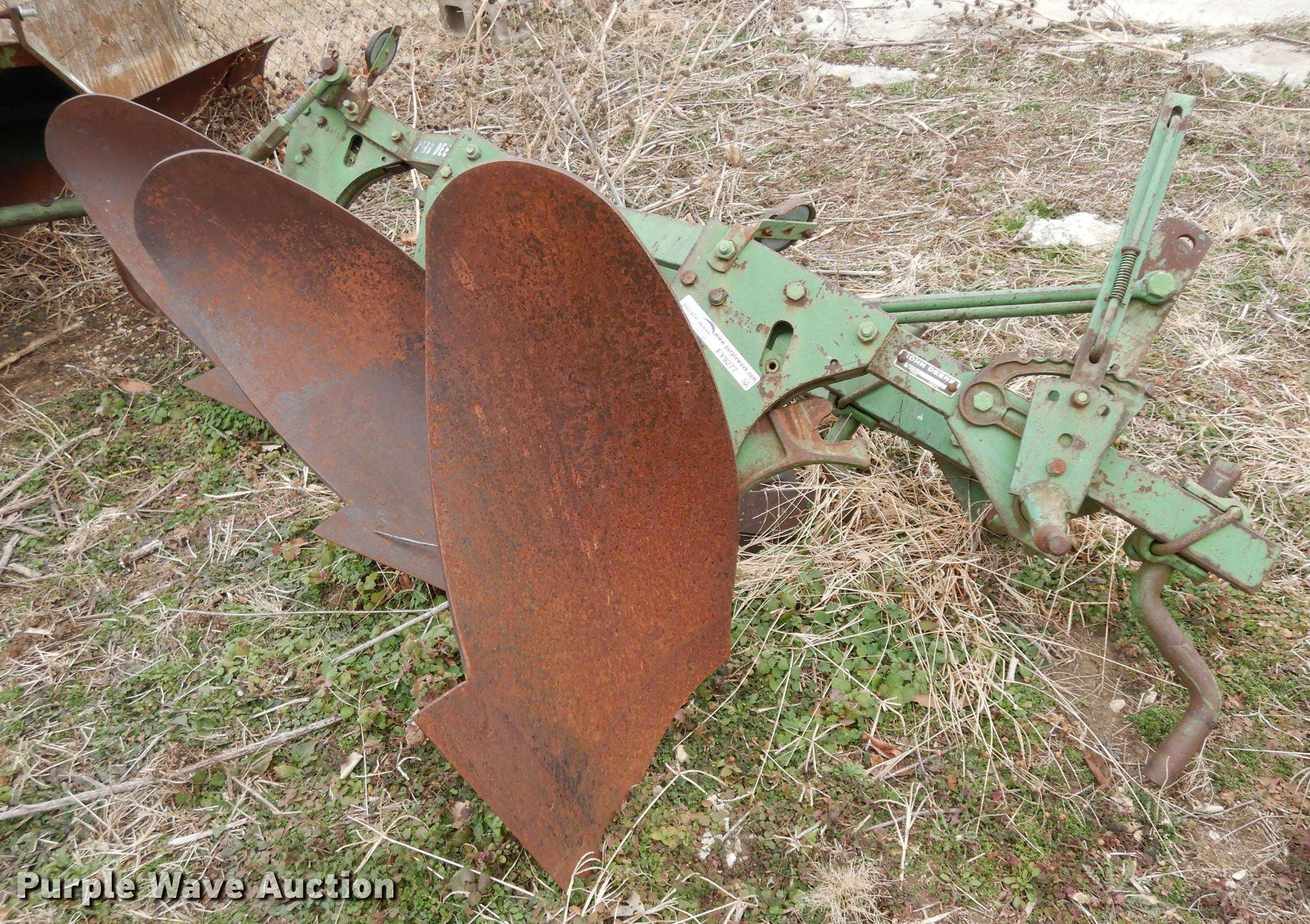 Three bottom plow in Tonganoxie, KS | Item FY9277 sold | Purple Wave