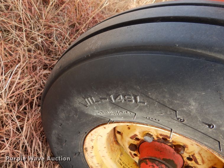 image for item DE1323 Hesston 1014 Hydro Swing windrower