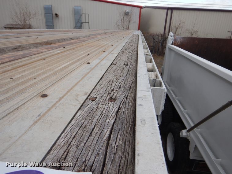 image for item DI2415 1998 Utility Trailer FA2CHA flatbed trailer