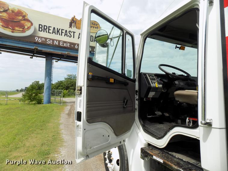 image for item FJ9285 2004 Freightliner FL70 flatbed truck