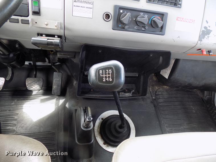 image for item FJ9285 2004 Freightliner FL70 flatbed truck