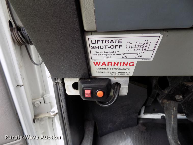 image for item FJ9285 2004 Freightliner FL70 flatbed truck