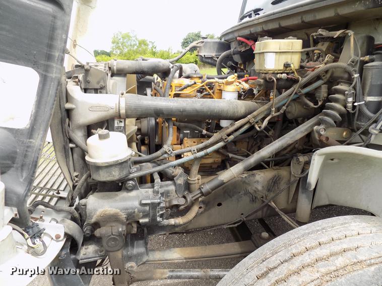 image for item FJ9285 2004 Freightliner FL70 flatbed truck