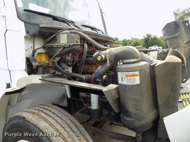 image for item FJ9285 2004 Freightliner FL70 flatbed truck