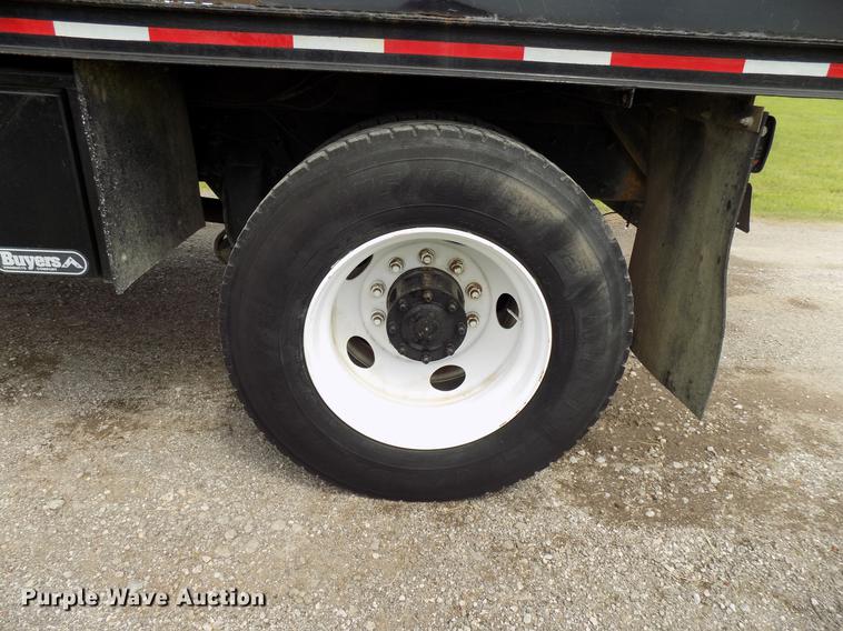 image for item FJ9285 2004 Freightliner FL70 flatbed truck