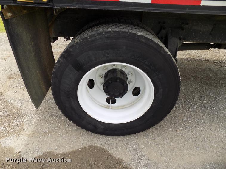 image for item FJ9285 2004 Freightliner FL70 flatbed truck