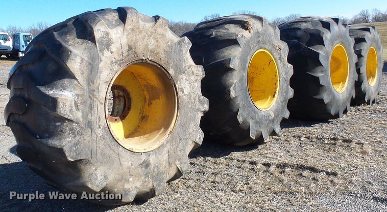 image for item DD1994 (4) Firestone 78x45.00-32 tires and wheels
