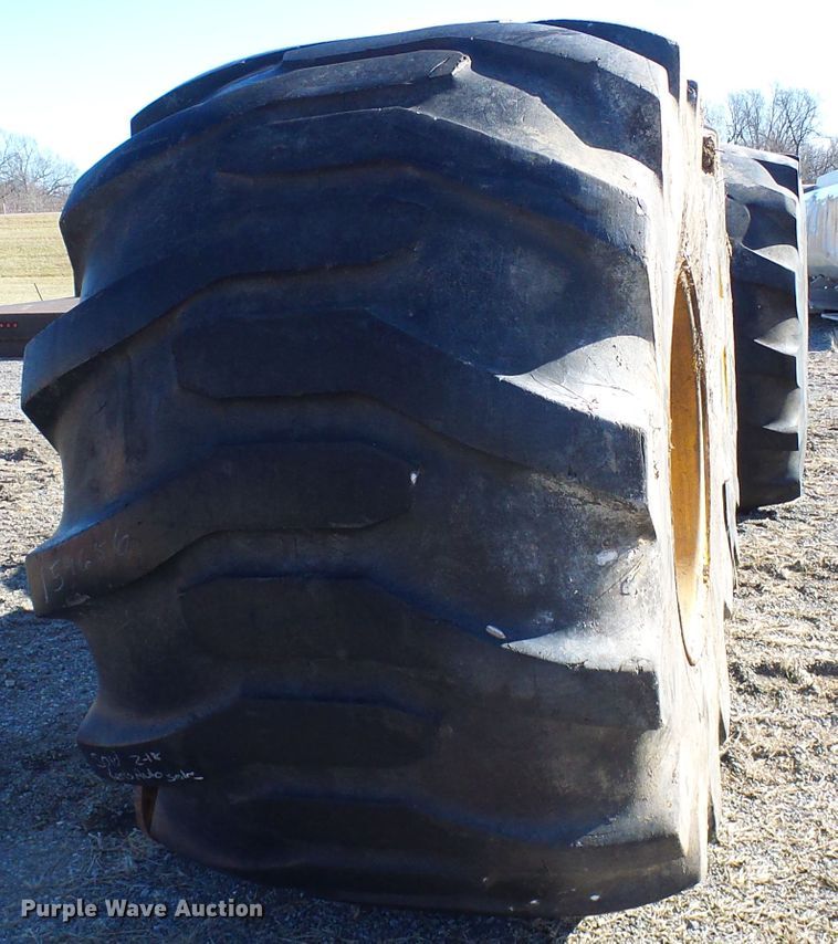 image for item DD1994 (4) Firestone 78x45.00-32 tires and wheels