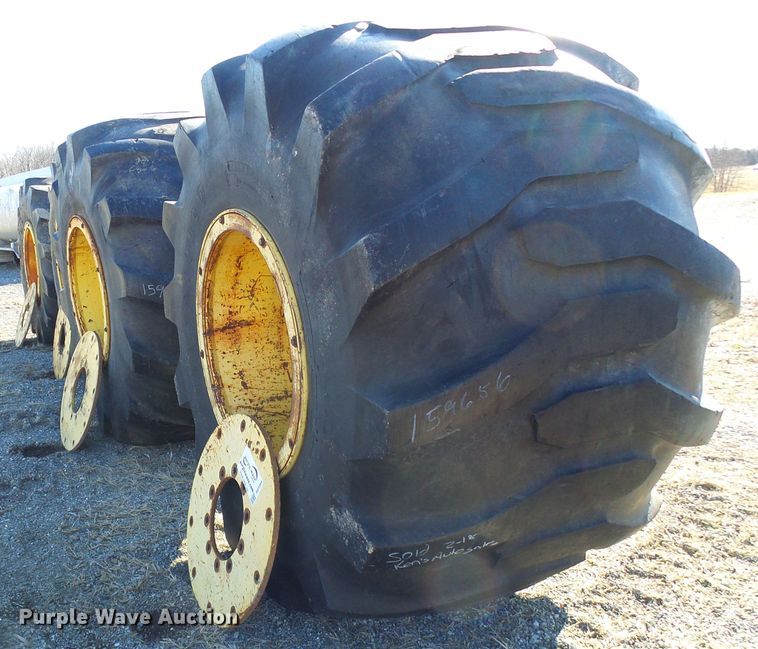 image for item DD1994 (4) Firestone 78x45.00-32 tires and wheels