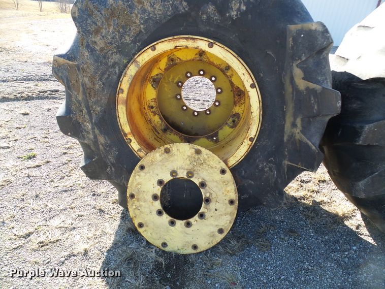 image for item DD1994 (4) Firestone 78x45.00-32 tires and wheels