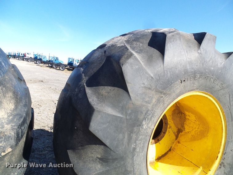 image for item DD1994 (4) Firestone 78x45.00-32 tires and wheels