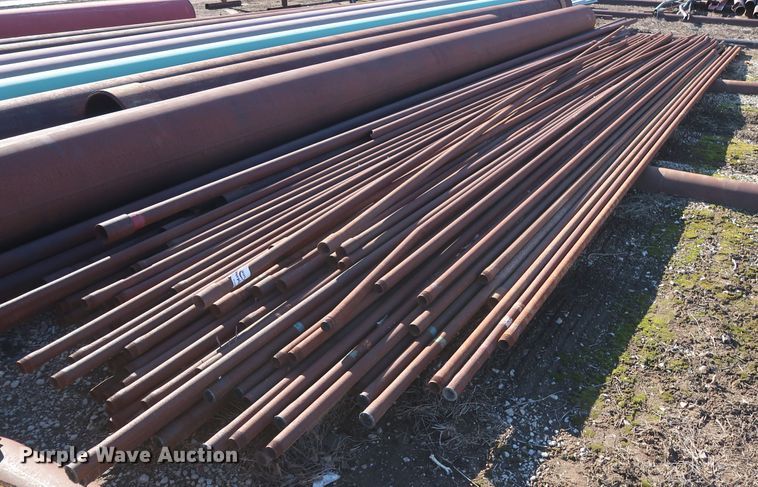 image for item DG7080 Approximately 75 31'L x 1.5" collared threaded oilfield tubing pipes