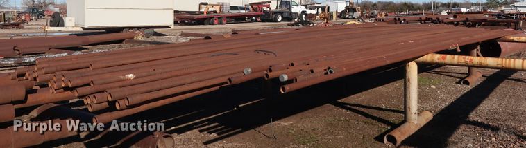 image for item DG7082 Approximately 75 31'L x 1 1/4" collared threaded oilfield tubing pipes