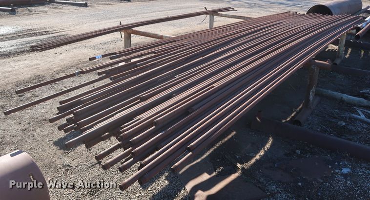 image for item DG7082 Approximately 75 31'L x 1 1/4" collared threaded oilfield tubing pipes