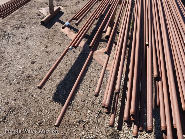 image for item DG7082 Approximately 75 31'L x 1 1/4" collared threaded oilfield tubing pipes