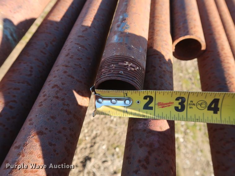 image for item DG7082 Approximately 75 31'L x 1 1/4" collared threaded oilfield tubing pipes