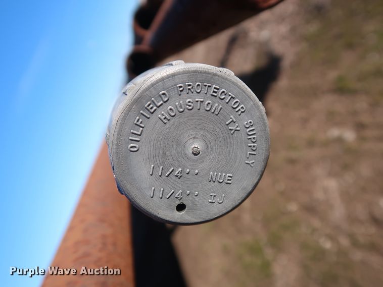 image for item DG7082 Approximately 75 31'L x 1 1/4" collared threaded oilfield tubing pipes