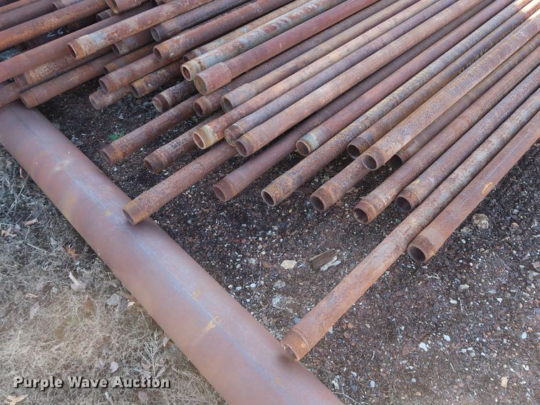 image for item DG7097 Approximately 130 31'L x 2 7/8" collared threaded oilfield tubing pipes