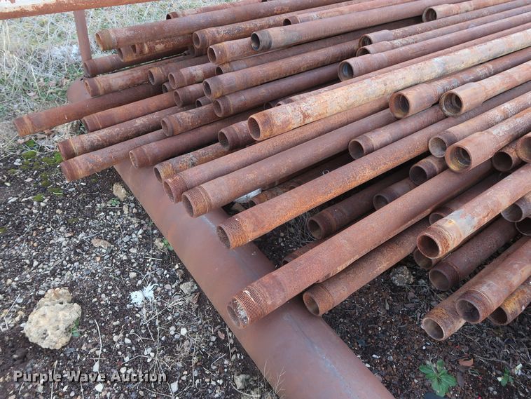 image for item DG7097 Approximately 130 31'L x 2 7/8" collared threaded oilfield tubing pipes