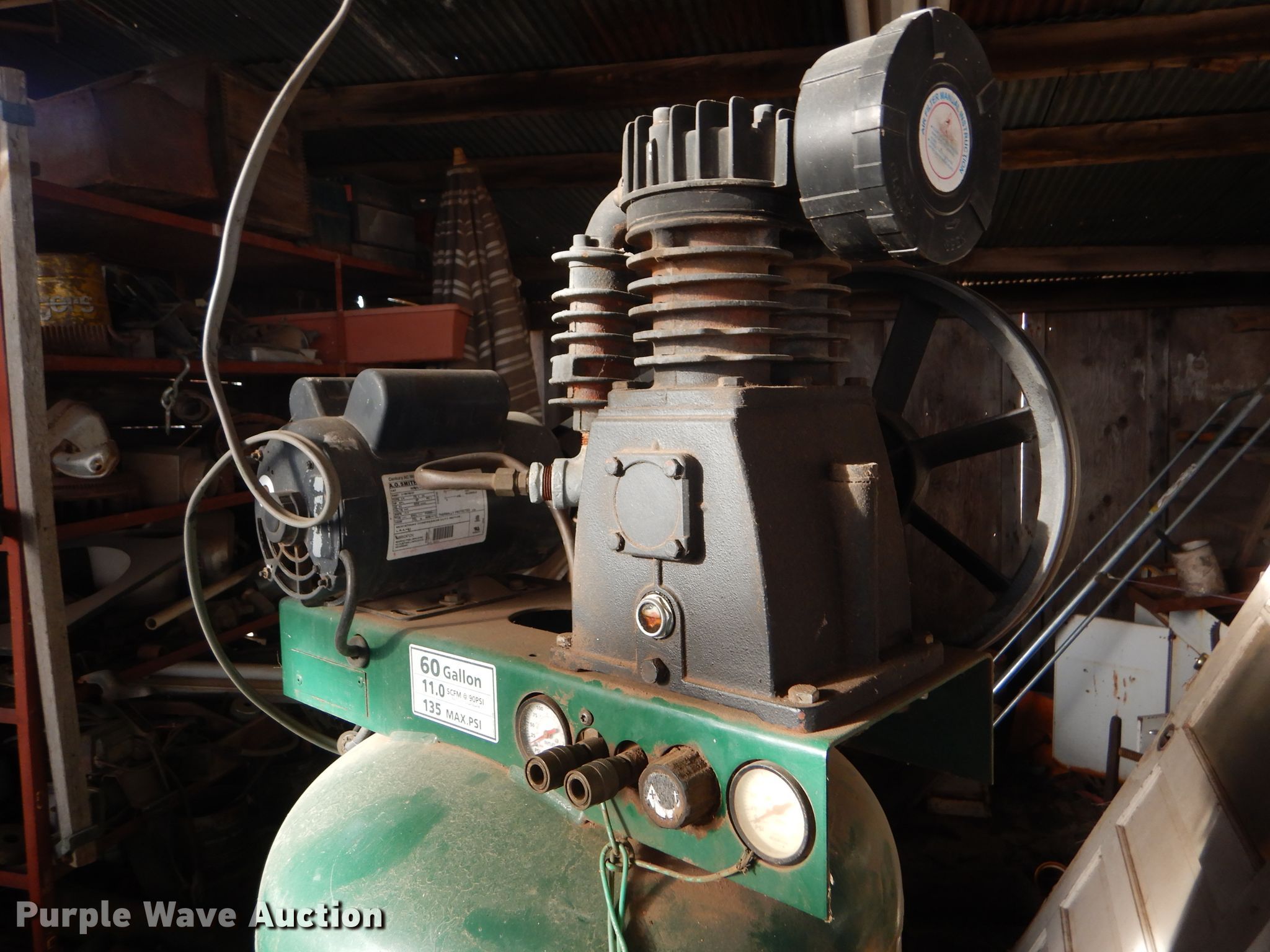 Farmhand air compressor in Lincoln, KS Item DE1339 sold Purple Wave