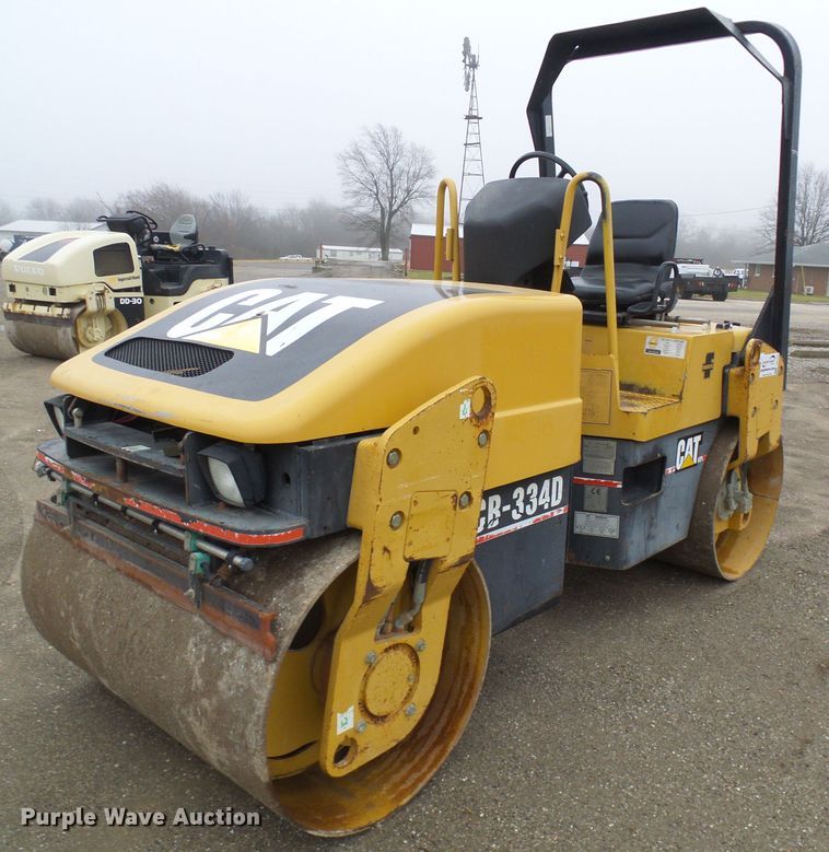 image for item DD1975 2001 Caterpillar CB-334D double drum vibratory roller