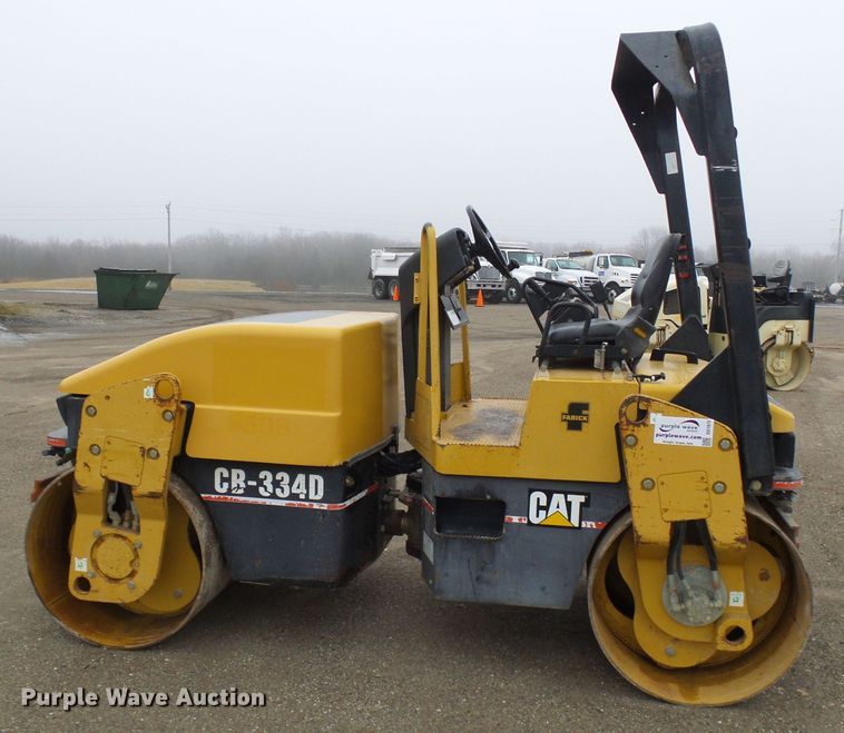 image for item DD1975 2001 Caterpillar CB-334D double drum vibratory roller