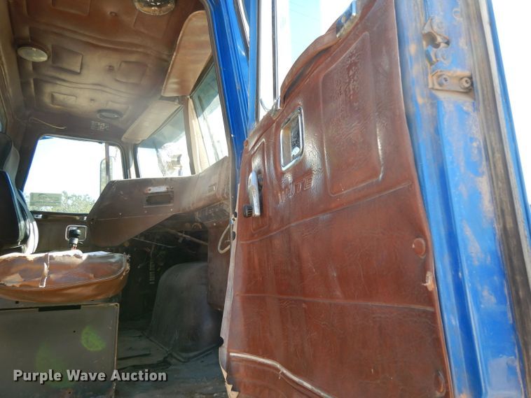 image for item DD3023 1985 White WCM dump truck