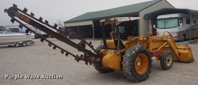 image for item DH6295 International 2444 tractor with trencher