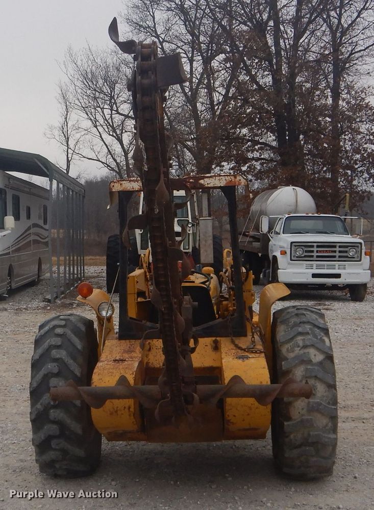 image for item DH6295 International 2444 tractor with trencher