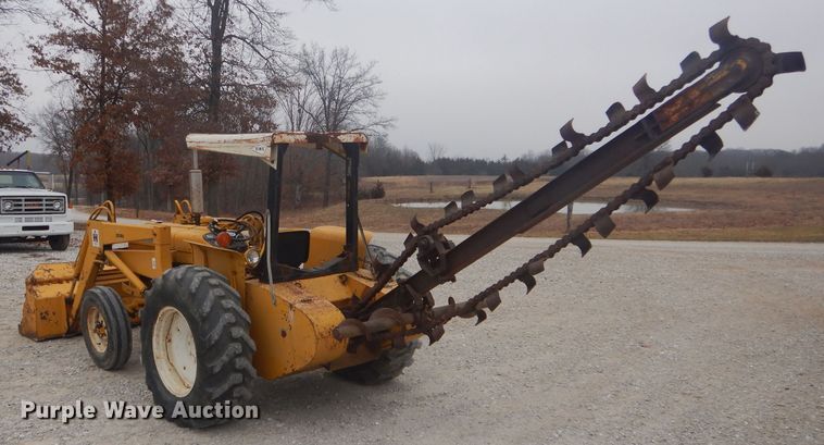 image for item DH6295 International 2444 tractor with trencher