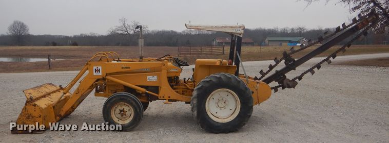 image for item DH6295 International 2444 tractor with trencher