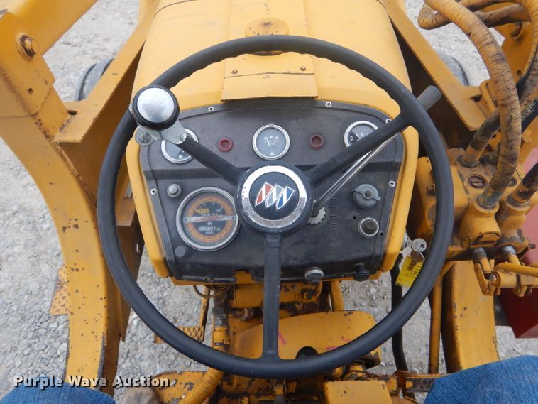 image for item DH6295 International 2444 tractor with trencher