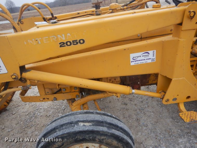 image for item DH6295 International 2444 tractor with trencher