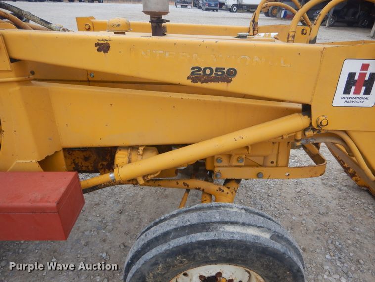 image for item DH6295 International 2444 tractor with trencher