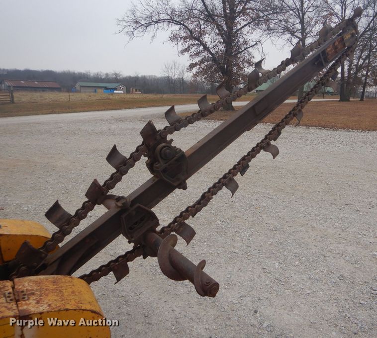 image for item DH6295 International 2444 tractor with trencher