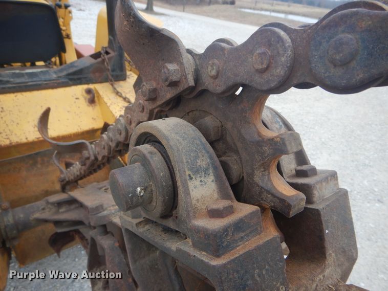 image for item DH6295 International 2444 tractor with trencher