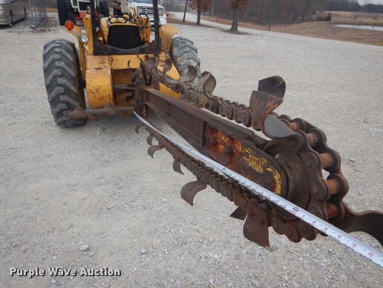 image for item DH6295 International 2444 tractor with trencher