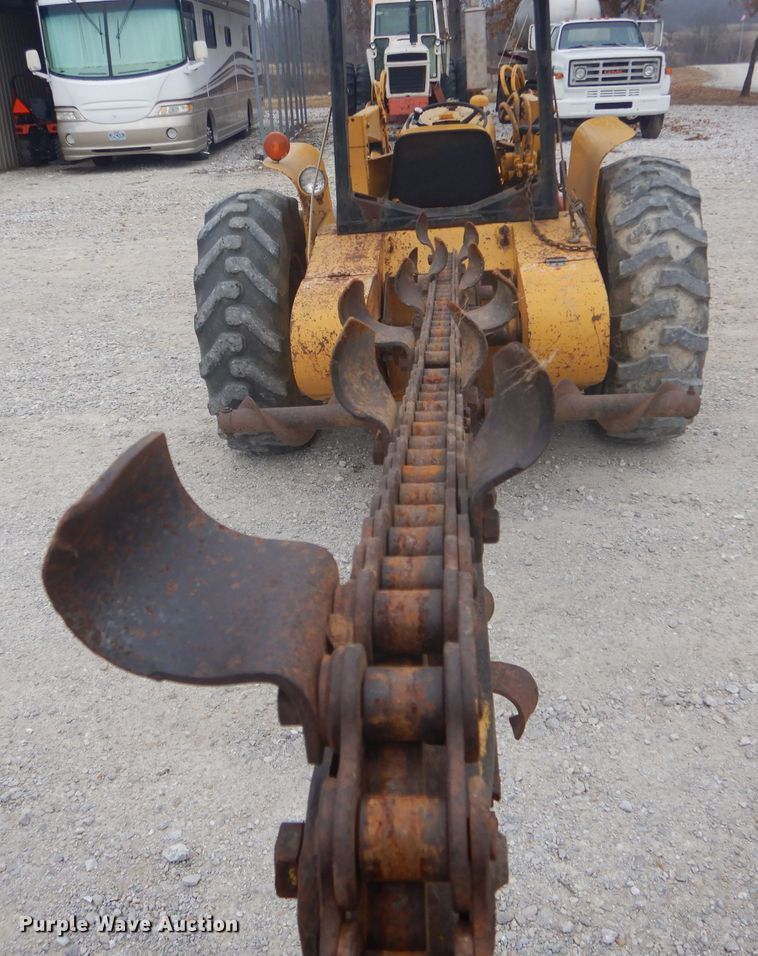 image for item DH6295 International 2444 tractor with trencher