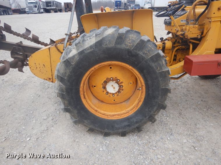 image for item DH6295 International 2444 tractor with trencher