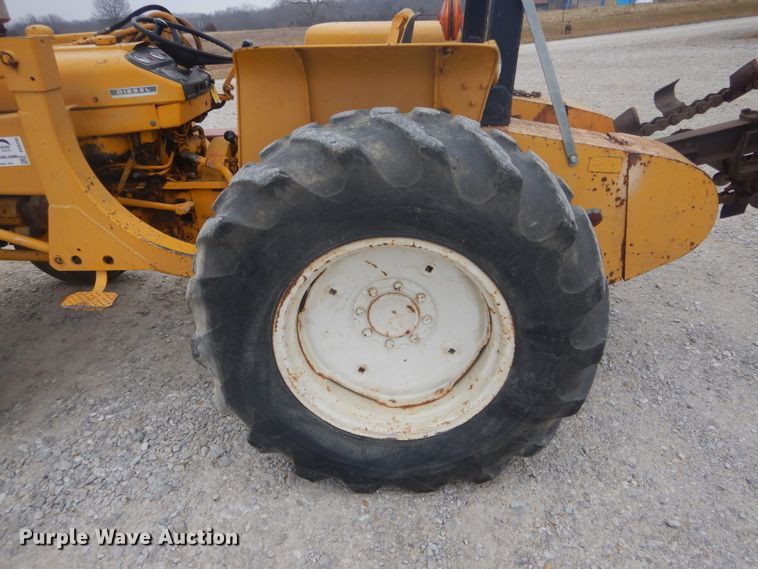 image for item DH6295 International 2444 tractor with trencher