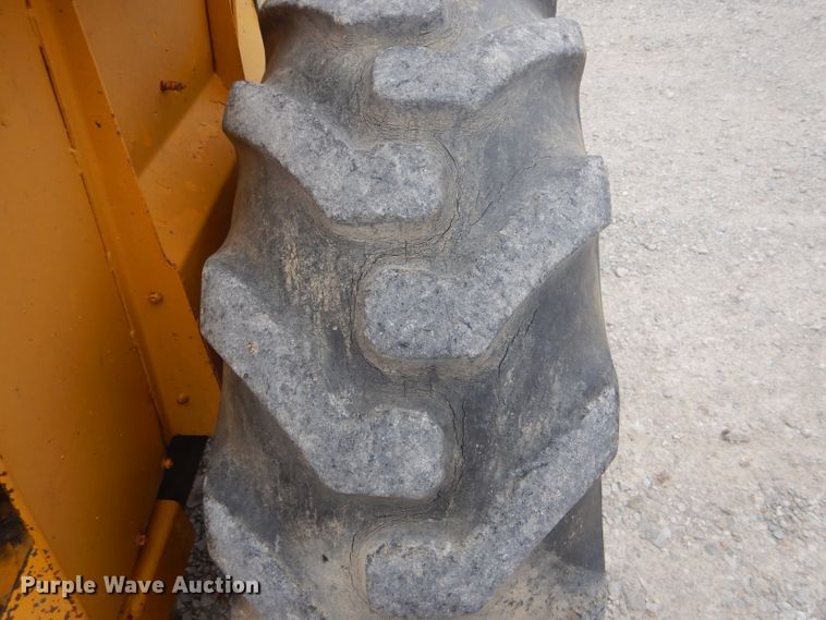 image for item DH6295 International 2444 tractor with trencher