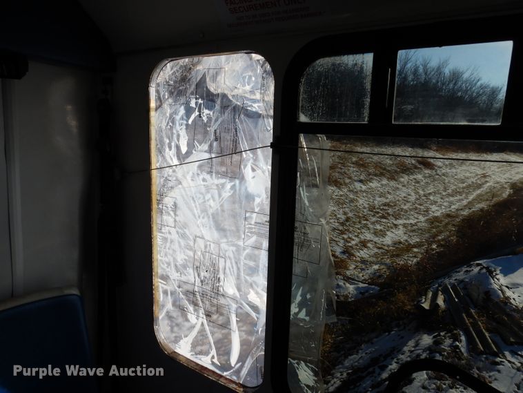 image for item DE4316 2012 Ford Econoline E450 Super Duty shuttle bus