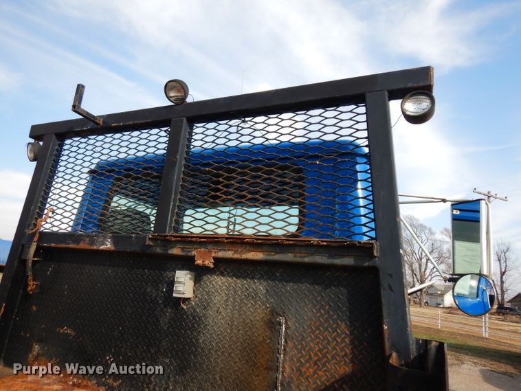 image for item DG6251 2000 International 4900 flatbed truck